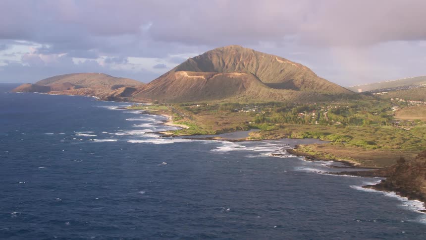 Aerial shot of a cliffside by the coast