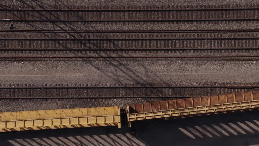A train driving on tracks outdoors