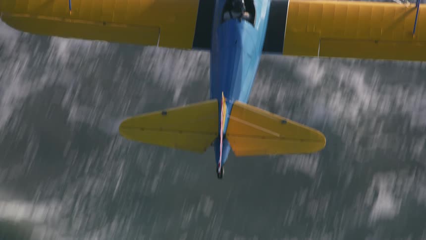 A plane is flying over the ocean