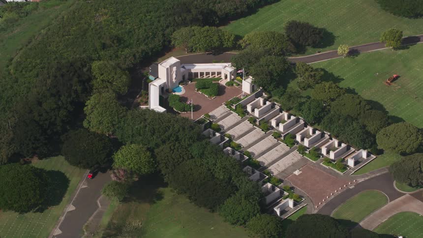 A building surrounded by grass and trees