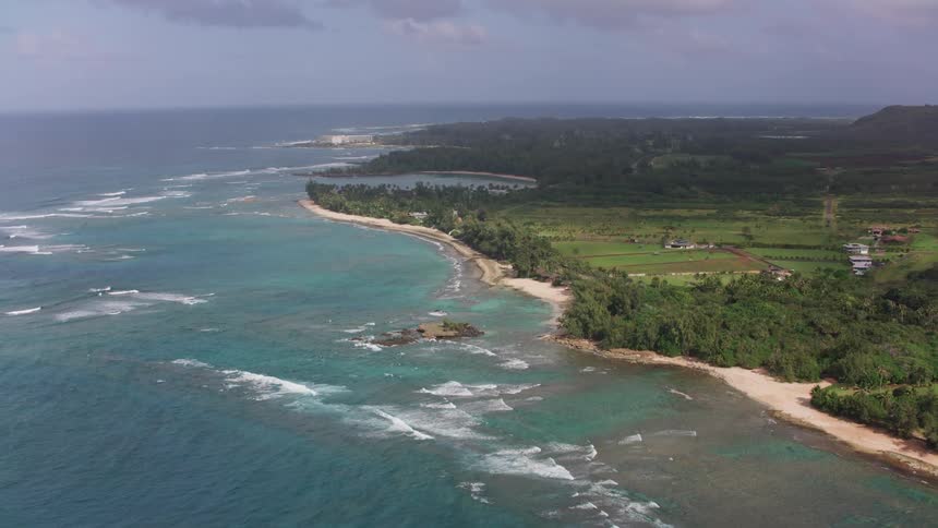 Aerial view of farmland near the beach on the coast