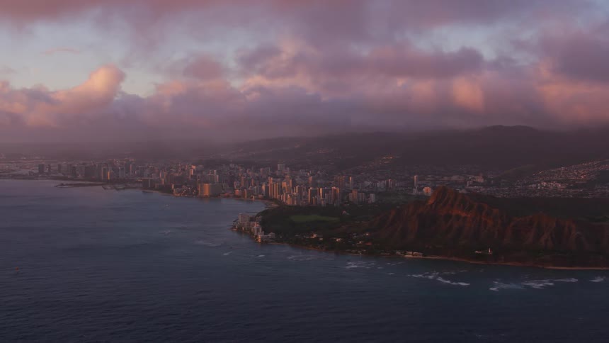 A city is on the waterfront near cliffs