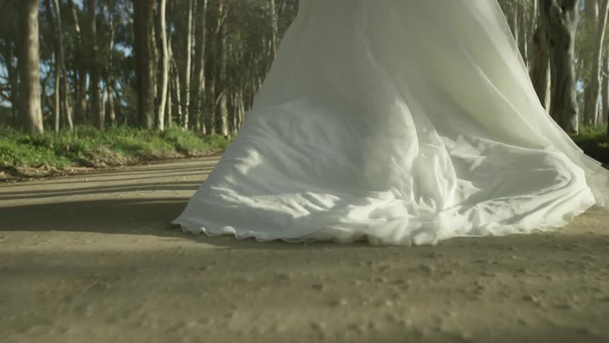 Person in gown walking