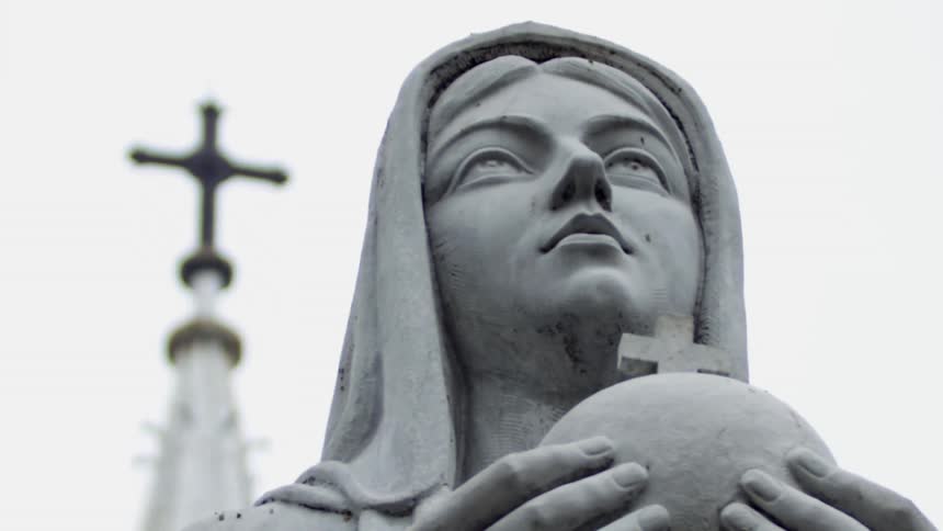 A view of a statue of a woman outdoors