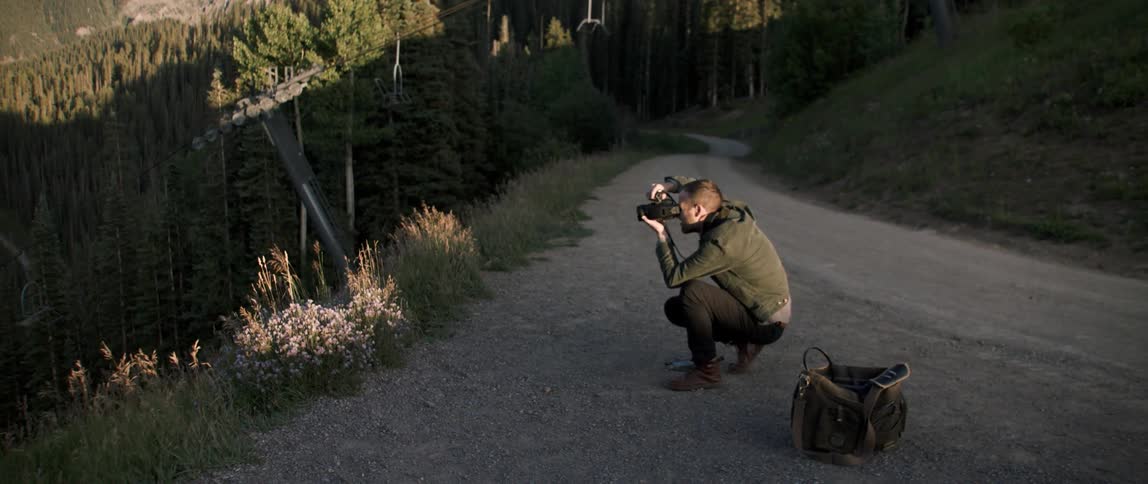 A photographer taking photos with a camera