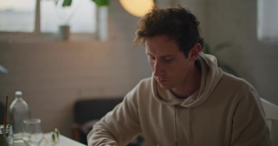 A man is working from his home office