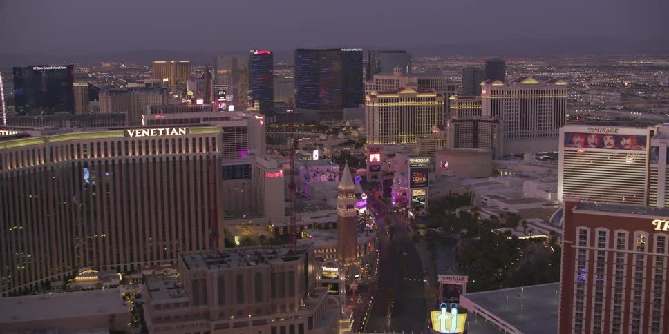 An aerial view of a city with large buildings