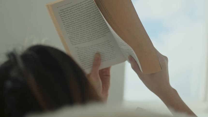 A woman reading a book