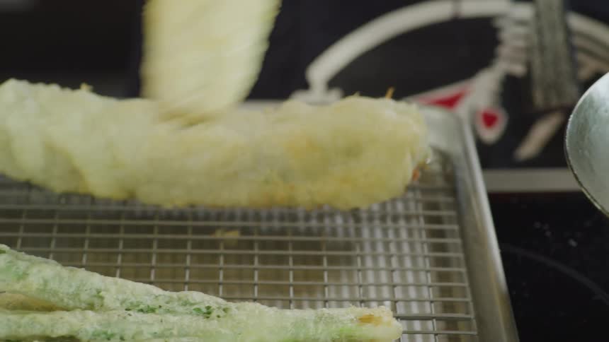 Person frying food