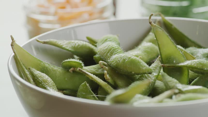 A view of a bowl of peas