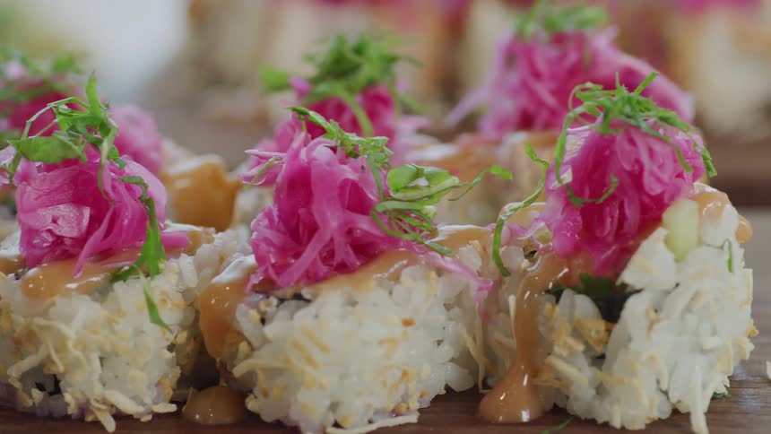 Food with garnish presented on a wood board