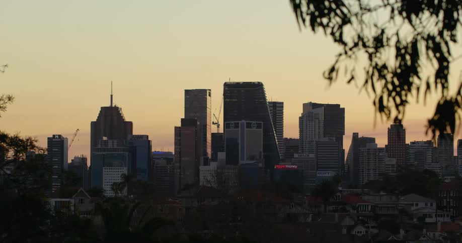 Wide shot of a city skyline at twilight
