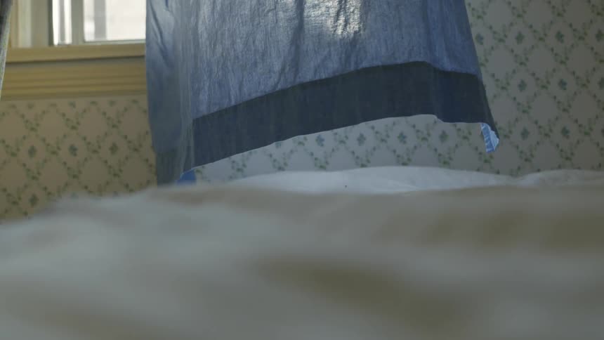 A view of some drapes in a house