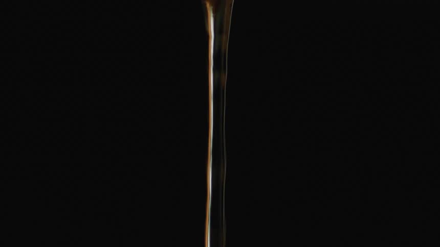 Abstract footage of a droplet of liquid dripping