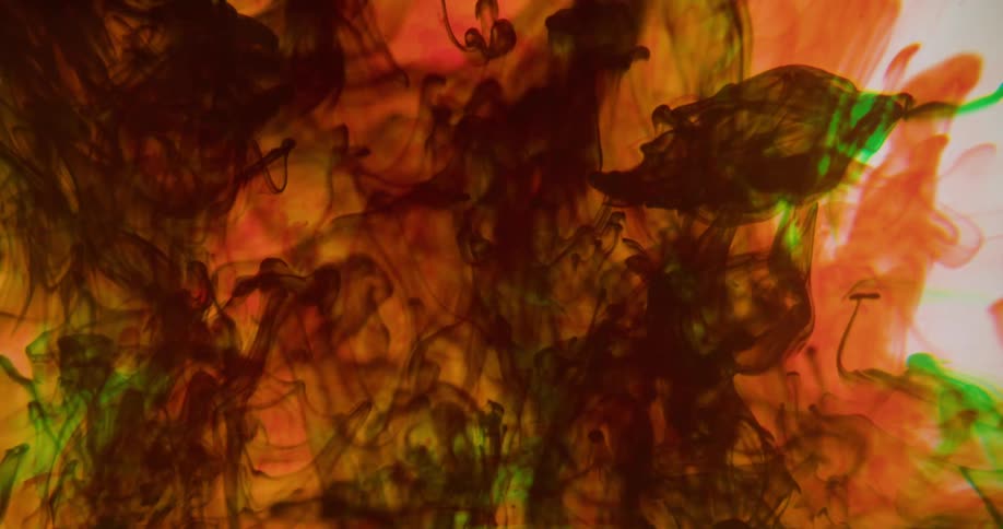 Green orange and white colors that look like water and paint