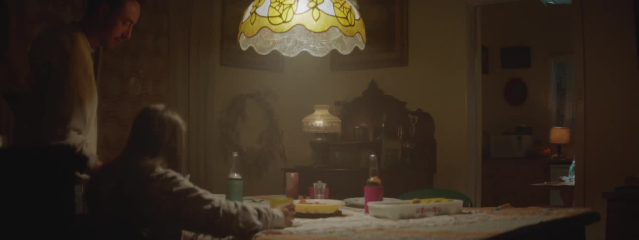 A family sitting down to eat dinner