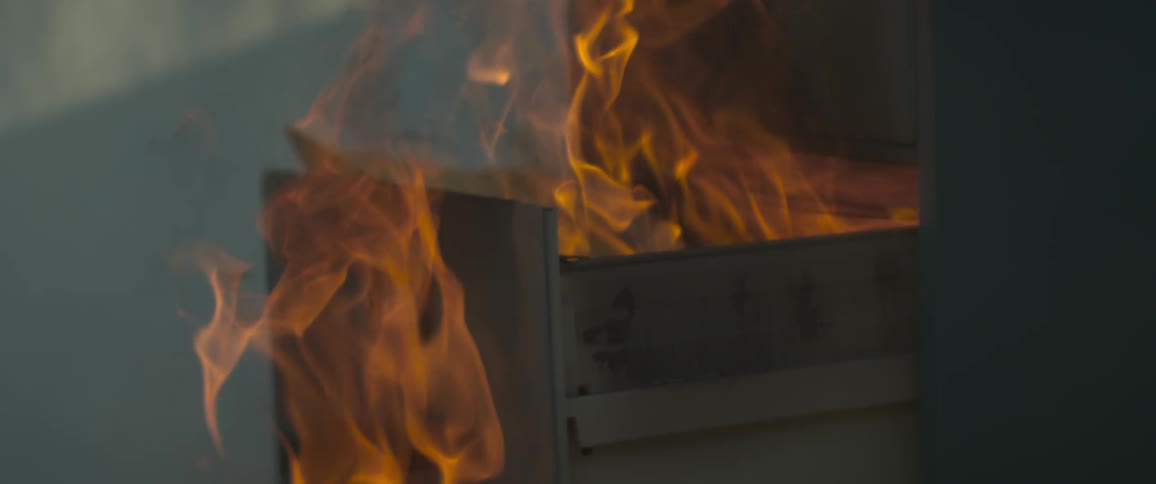 Fire engulfs a filing cabinet