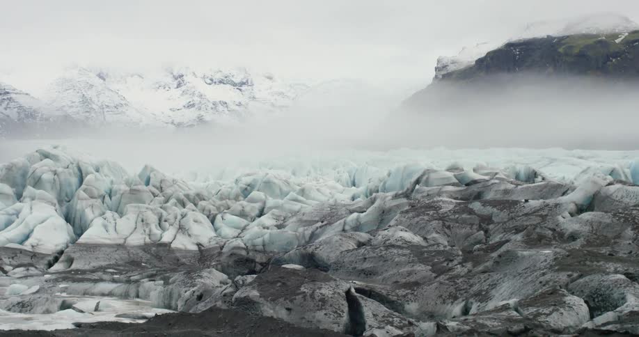 An icy plane has fog on the surface of the ice