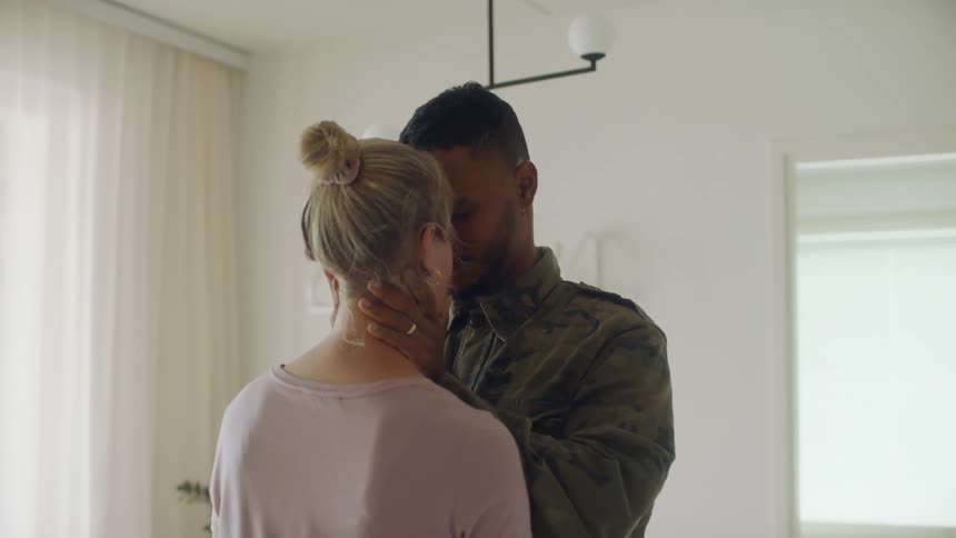 Male hugging female