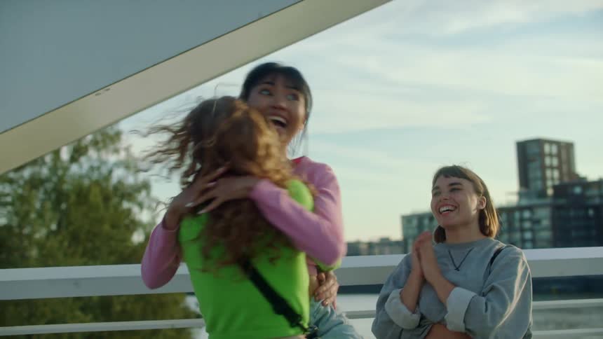 A group of friends hugging each other