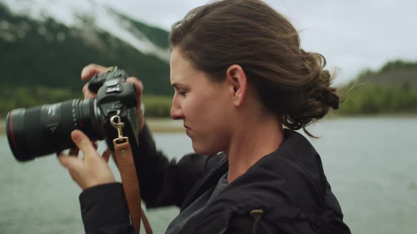 A photographer taking a photo of the landscape