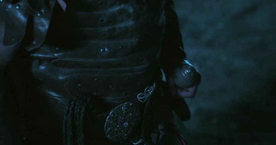 A man in armor outdoors