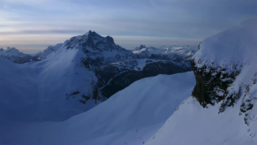 Aerial shot of a snow clad mountain