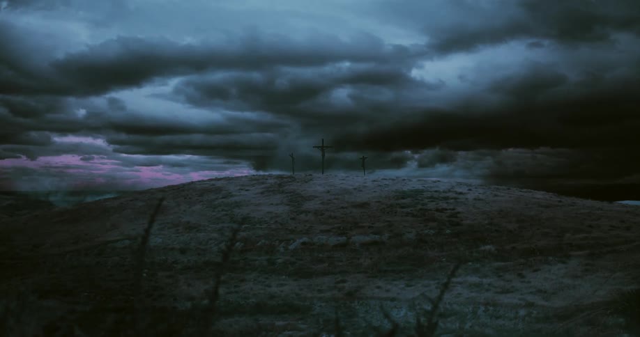 Time lapse of storm clouds and lighting rolling over crosses for crucifixion standing over a hill