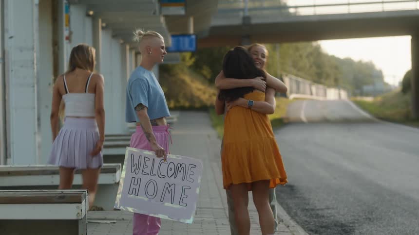 A group of friends greeting each other