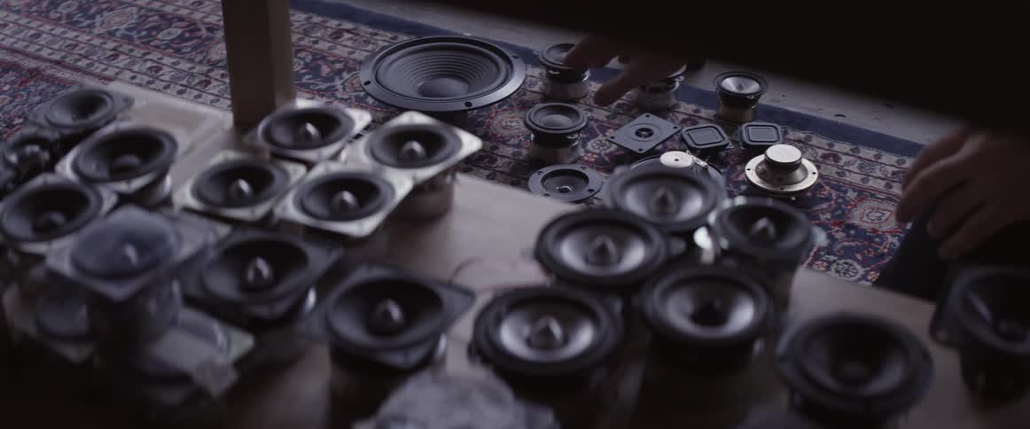 Small speakers are being placed and sorted