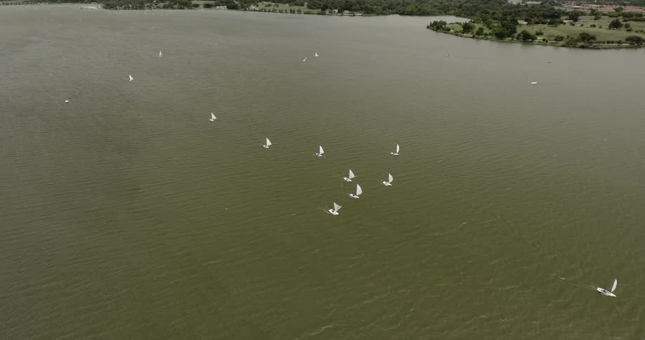 Sailboats in a lake on a clear day