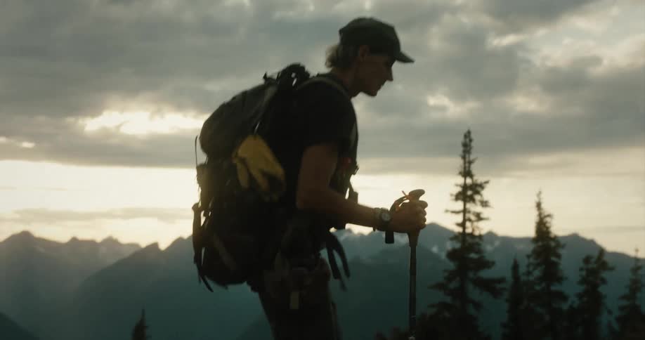 A man is hiking on the mountain