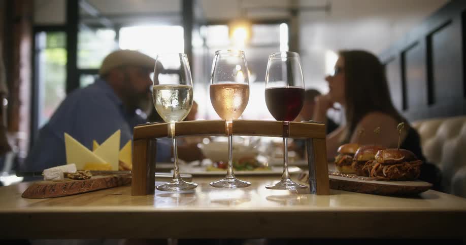 Glasses of wine on table