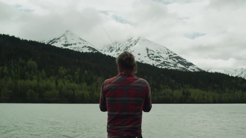 Person fishing outdoors