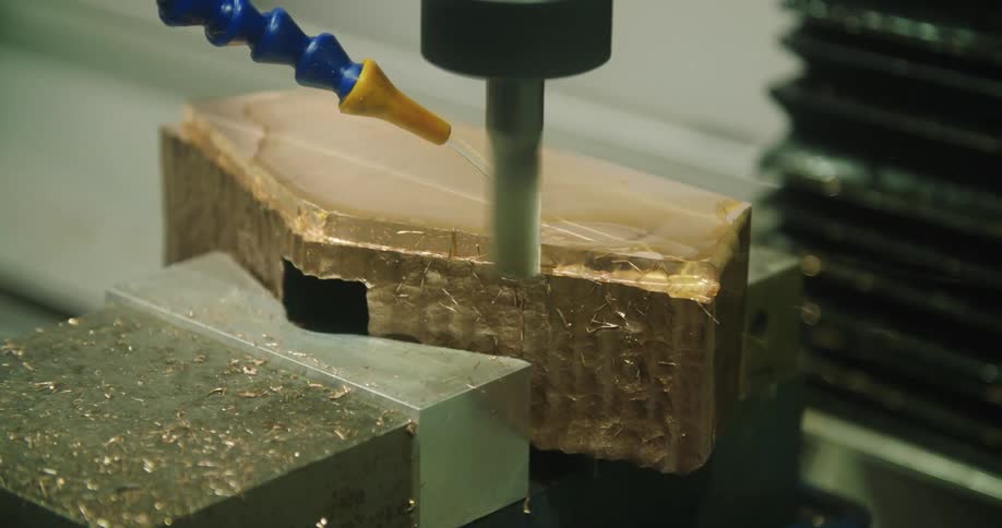 Piece of metal carved by an autonomous lathe