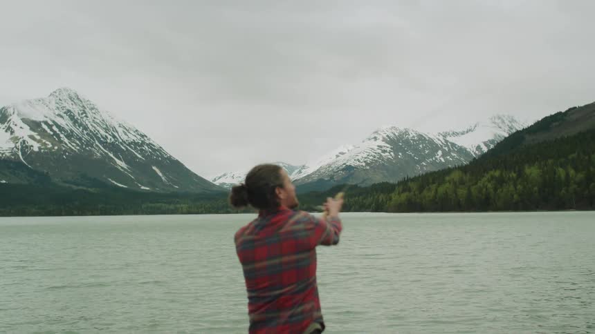 Person fishing outdoors