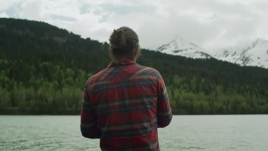 A man is fishing in the lake