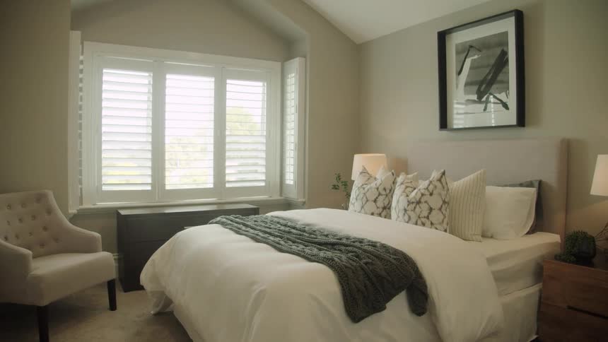 Bed with cover in a room