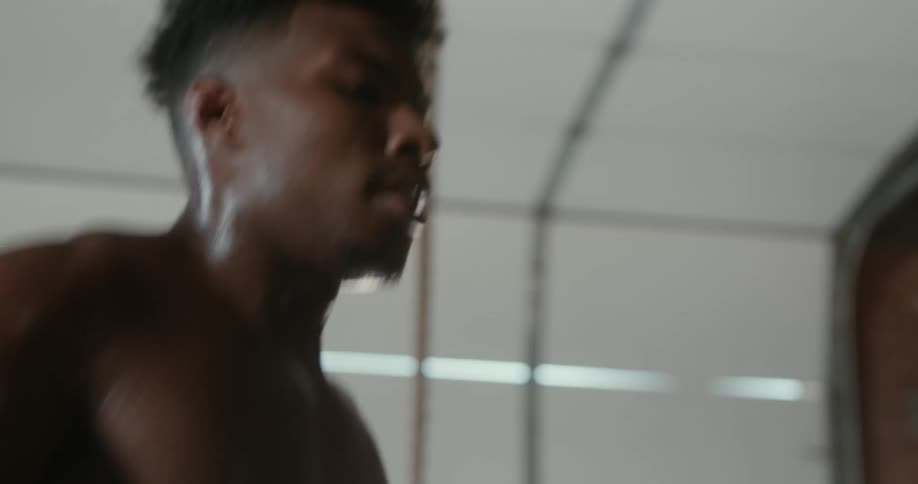 A man stops his run in the garage