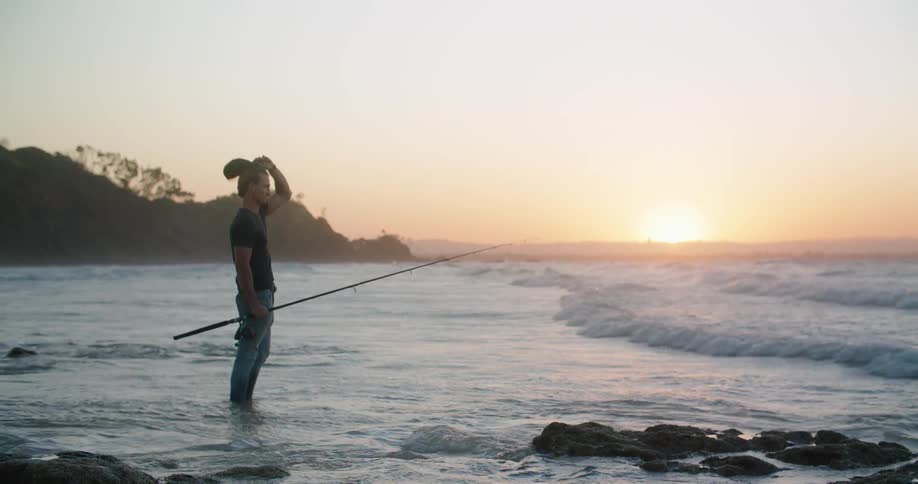 A man fishing in the ocean