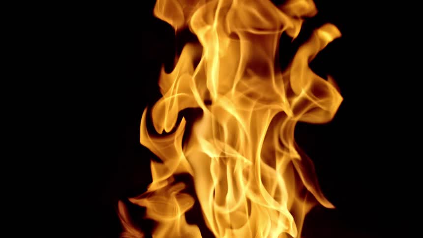 Flames are rising in the darkness