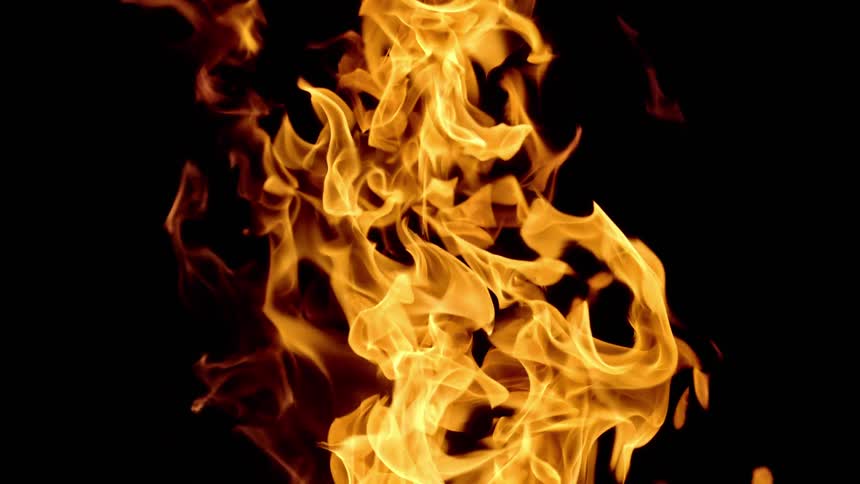Flames are rising in the darkness