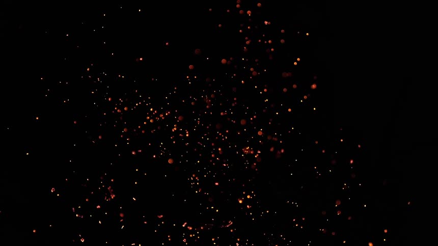 Colorful confetti explodes against a black background