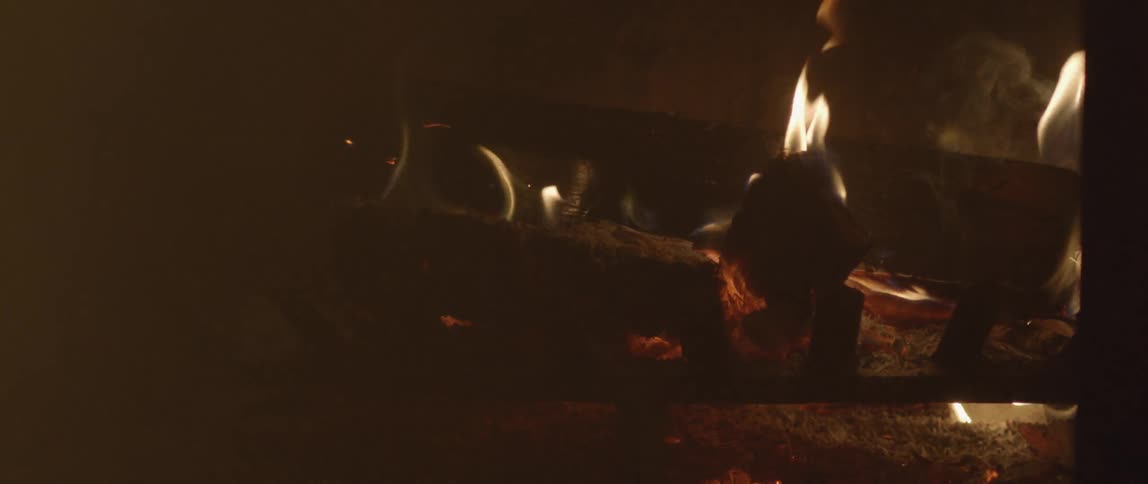 Kindling burning in a fireplace