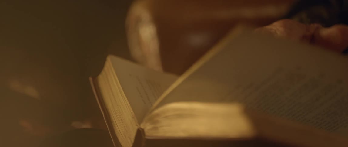 Close up of pages in a book being turned