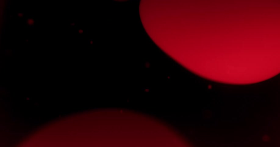 A close up of balls in a lava lamp