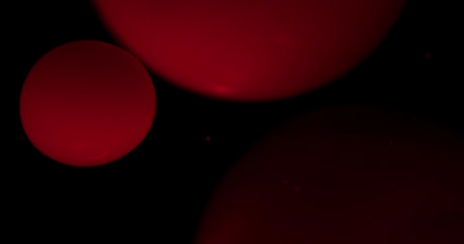 A close up of balls in a lava lamp