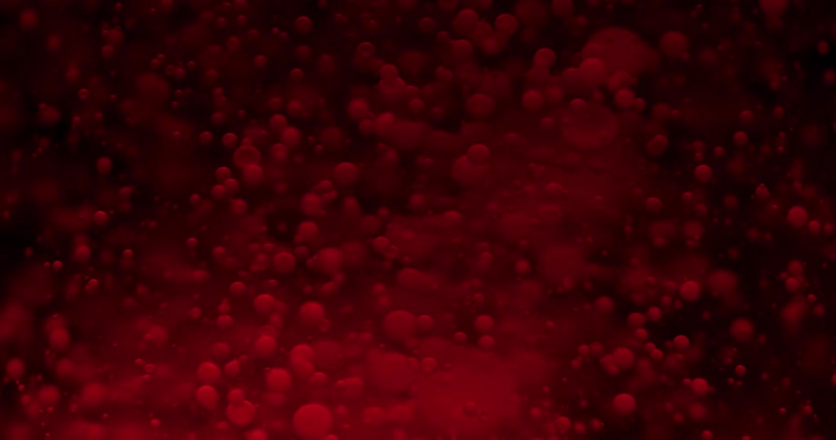 Red bubbles move around in a red atmosphere