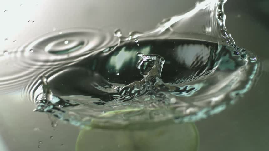 A view of citrus falling into water