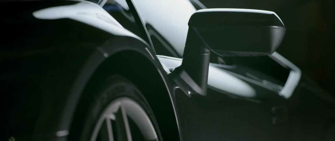 Close up of the rear view mirror outside a car